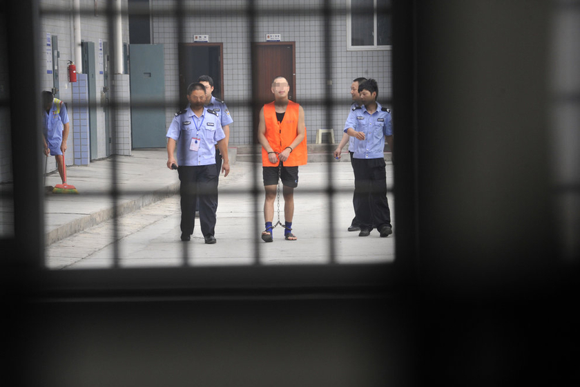 被枪决前的27岁毒贩_图片频道_财新网