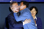 一周天下：文在寅赢得韩国大选 安熙正激情献吻