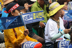 韩宣布暂停“萨德”进行环评 民众集会要求取消部署