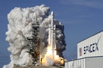 SpaceX猎鹰重型火箭发射成功 携跑车进太空