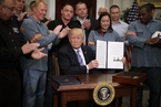 特朗普正式签署钢铝关税协议