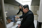 朝鲜遇难中国游客遗体和伤员送返 金正恩送行