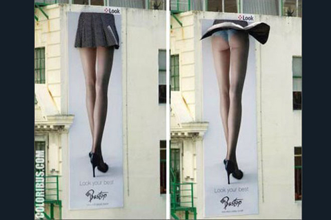 内衣广告：这是位于新西兰的一幅极具挑逗性的内衣店广告，图中是一个巨大的裙子，当有微风吹起时，裙下的一切将一览无余。