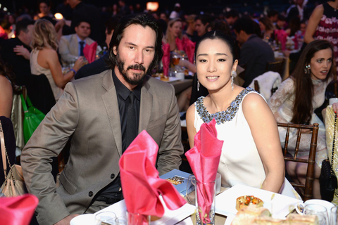 当地时间2014年3月2日，美国洛杉矶，第86届奥斯卡金像奖颁奖礼。巩俐与基努·里维斯。