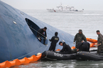 韩国沉船已9人遇难 近300人失踪
