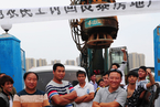 报告称农民工集体行动推动工会改革