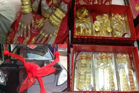 近日网传一组福建泉州新娘的嫁妆图，新娘不仅全身戴满黄金首饰，更传言手臂戴满金手镯是标配。曝光的嫁妆中，千万的别墅、聘金都“闪瞎”不少网友。     图片来源网络