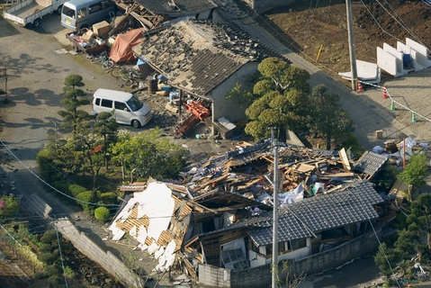 Collapsed houses caused by an earthquake are seen in Mashiki town